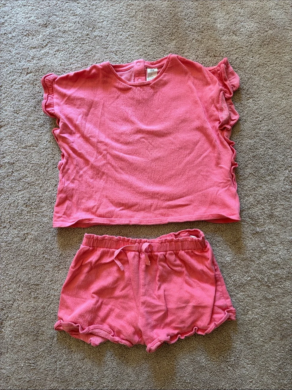 Two sets and two rompers 4T